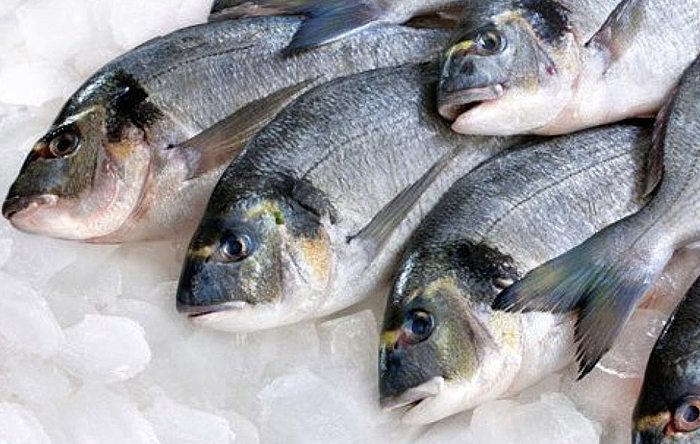 Red label seafood is seen as unsustainable and will no longer be sold at Whole Foods.