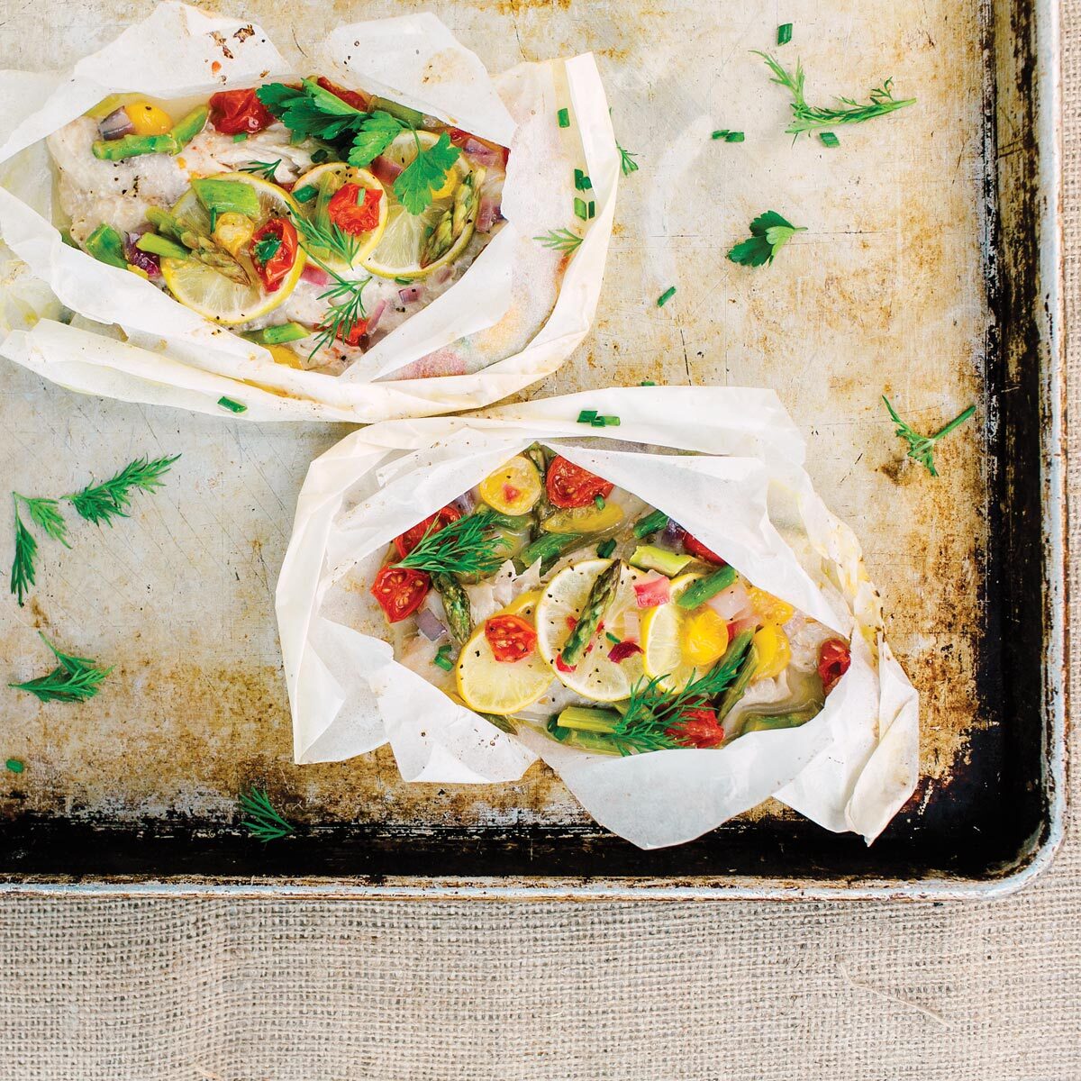 Fish in Parchment With Asparagus, Tomatoes, and Herbs