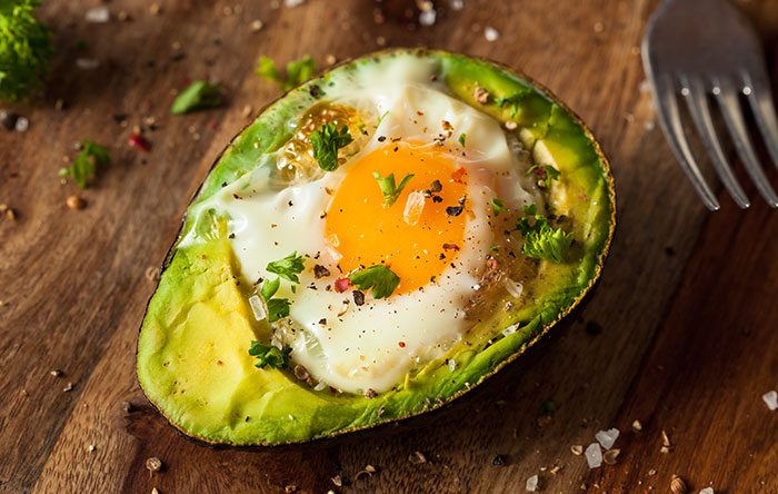 Avocado baked with an egg