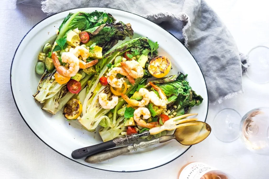 Cheap dinner ideas: Grilled Romaine Salad With Corn, Fava Beans, And Avocado