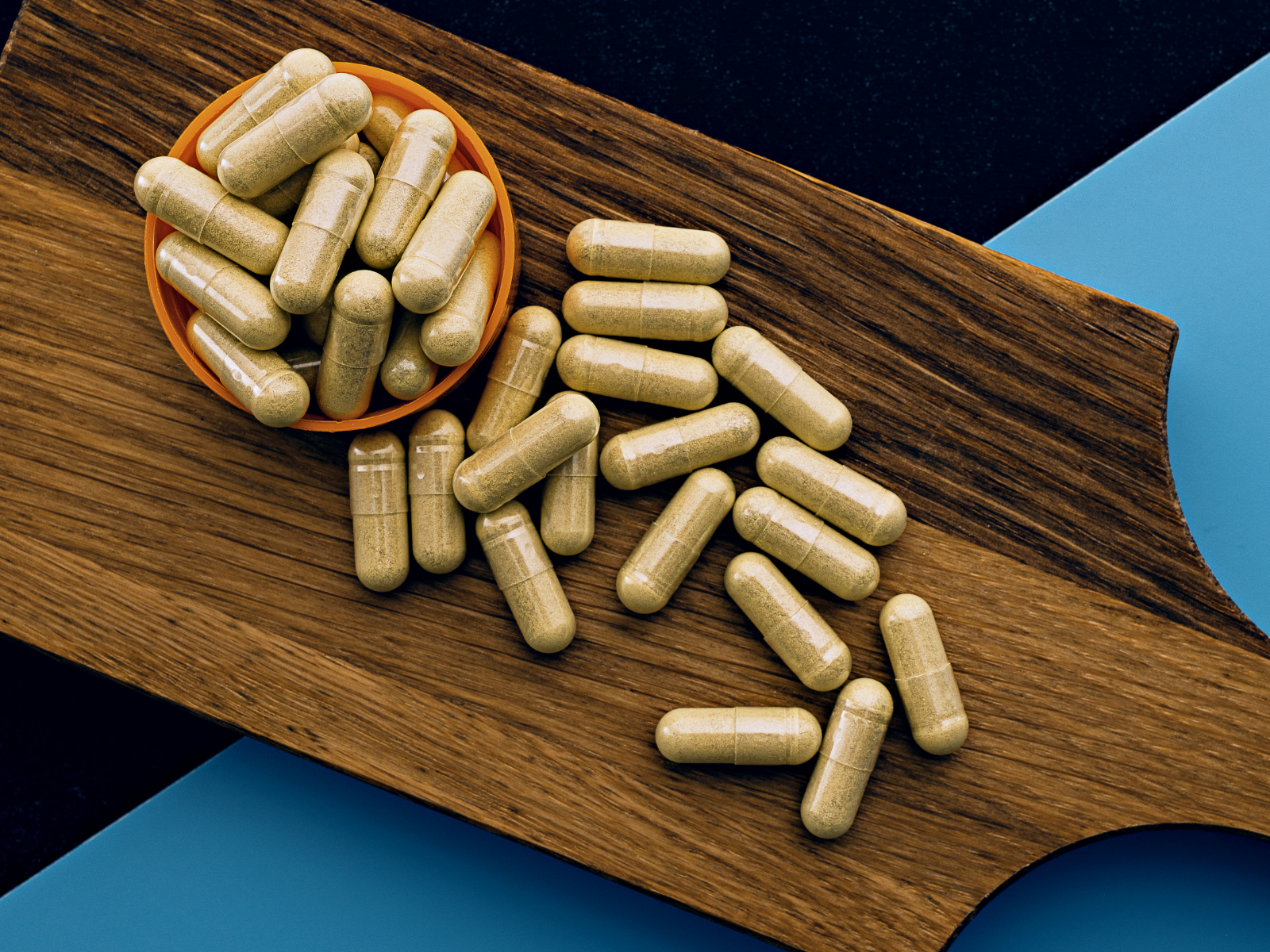 Quercetin supplements on a cutting board