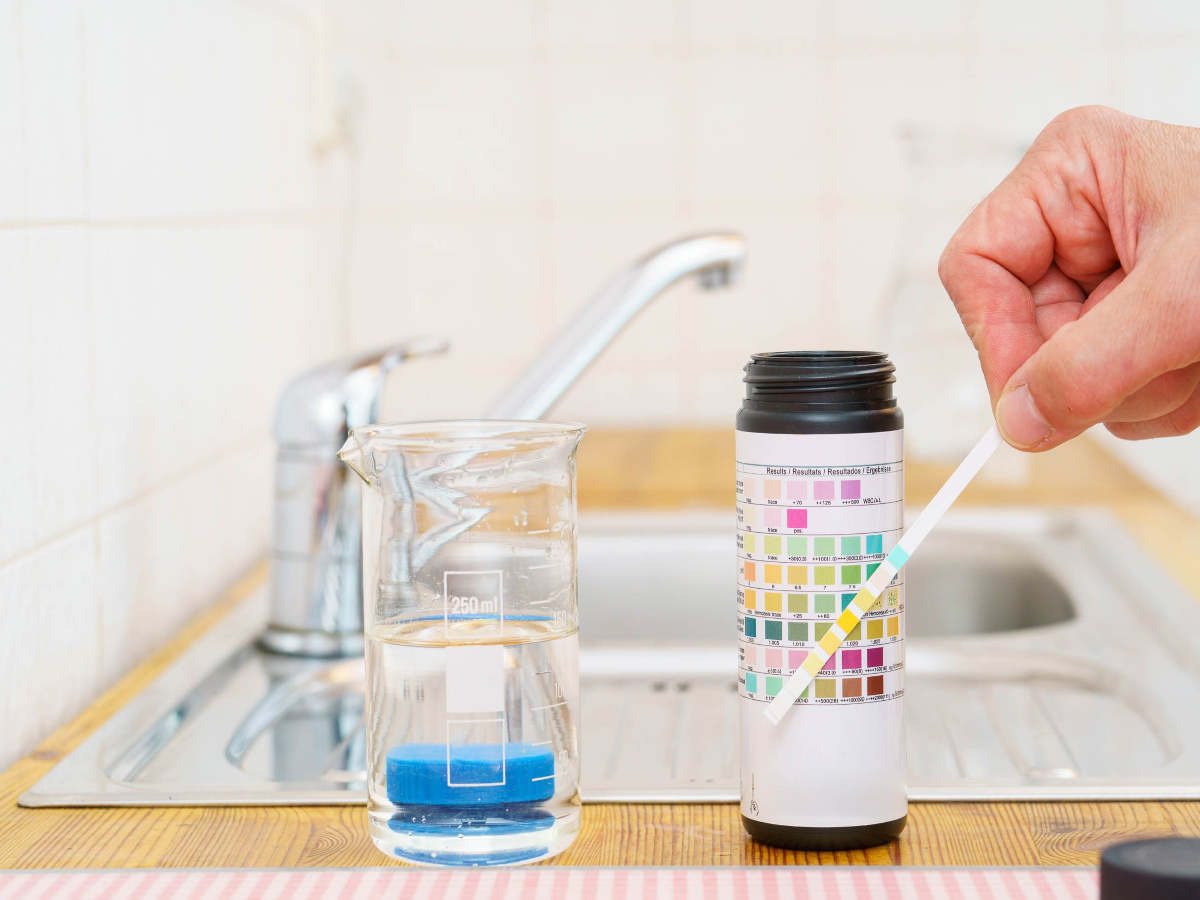 Is tap water safe to drink? A home water test kit in use