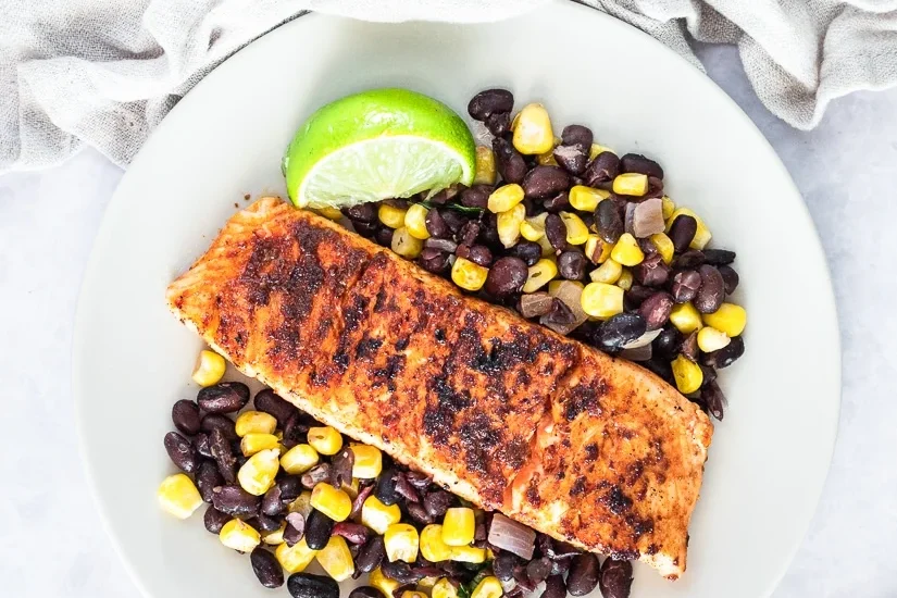 Grilled salmon with black beans and corn