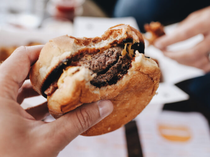 bite of a burger at a restaurant