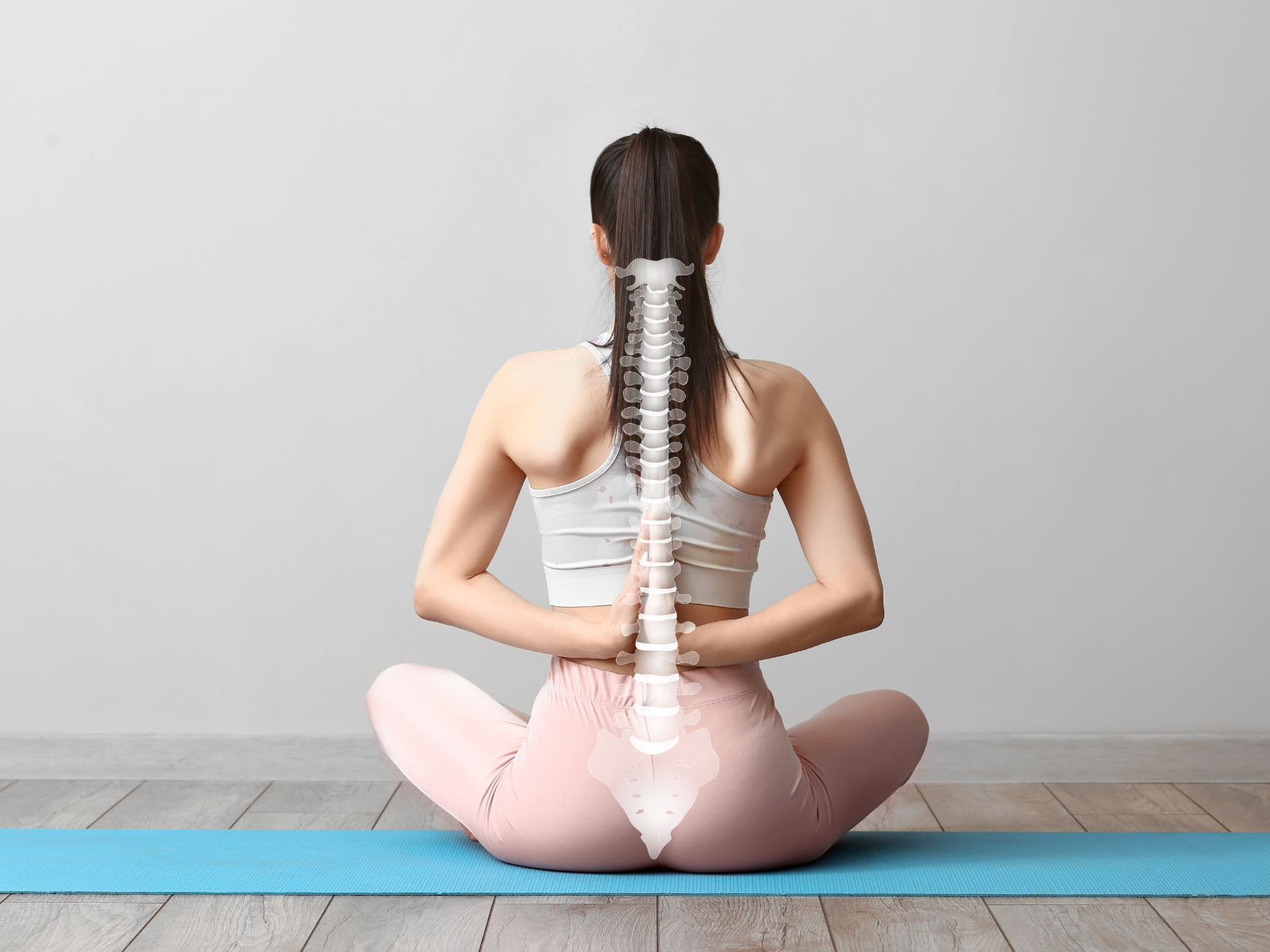 woman doing a yoga pose with a straight spine