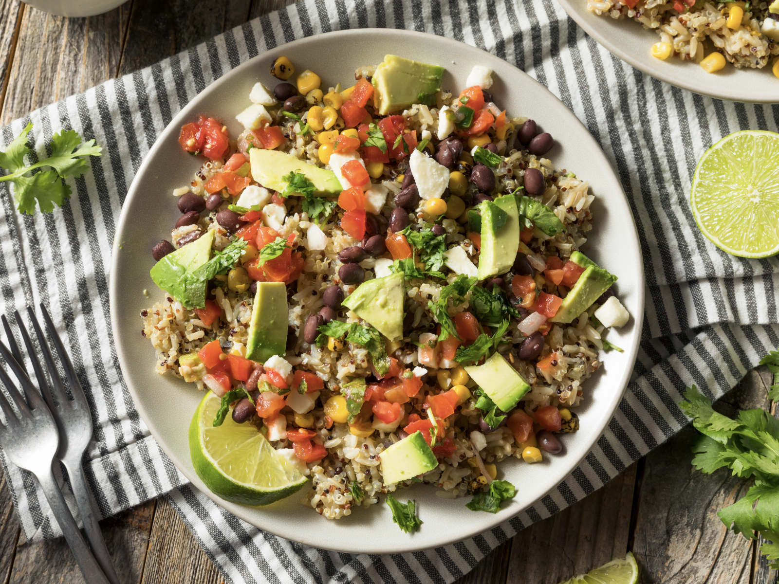 burrito bowl with brown rice and avocado and beans