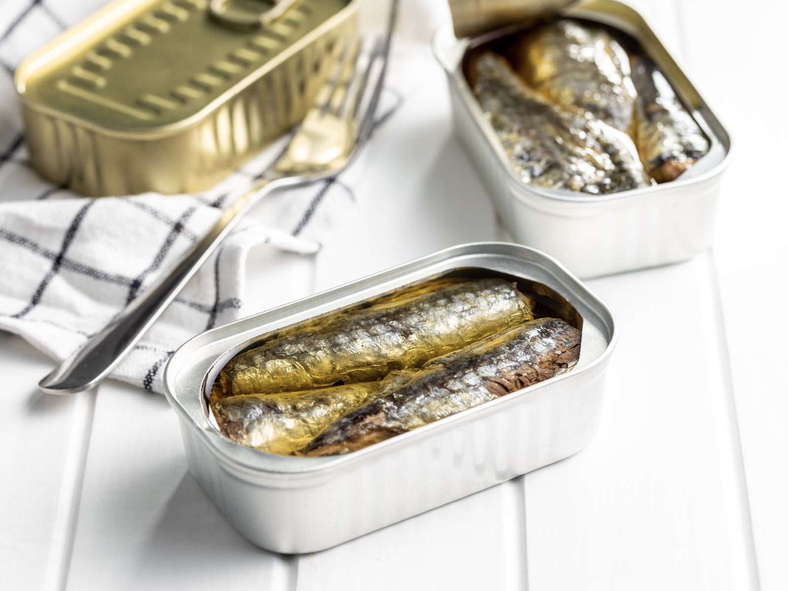 opened cans of sardines