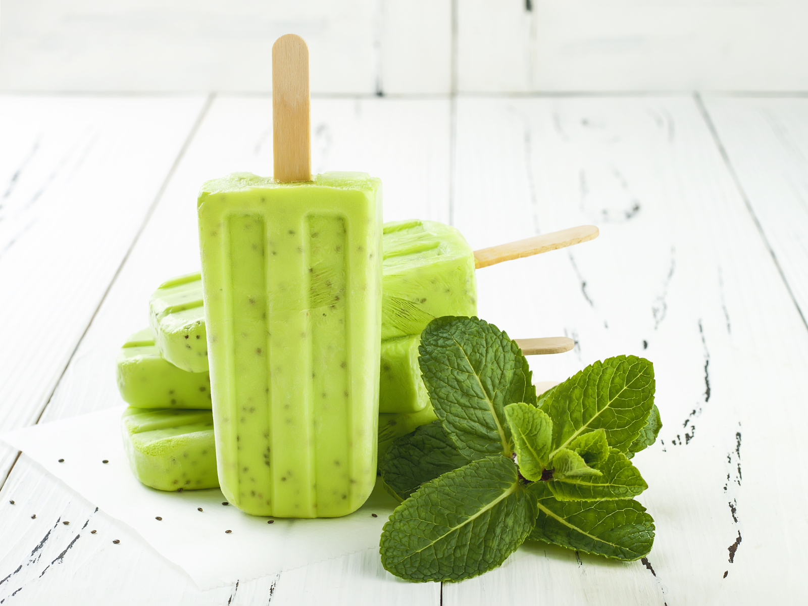 green tea popsicles on a counter