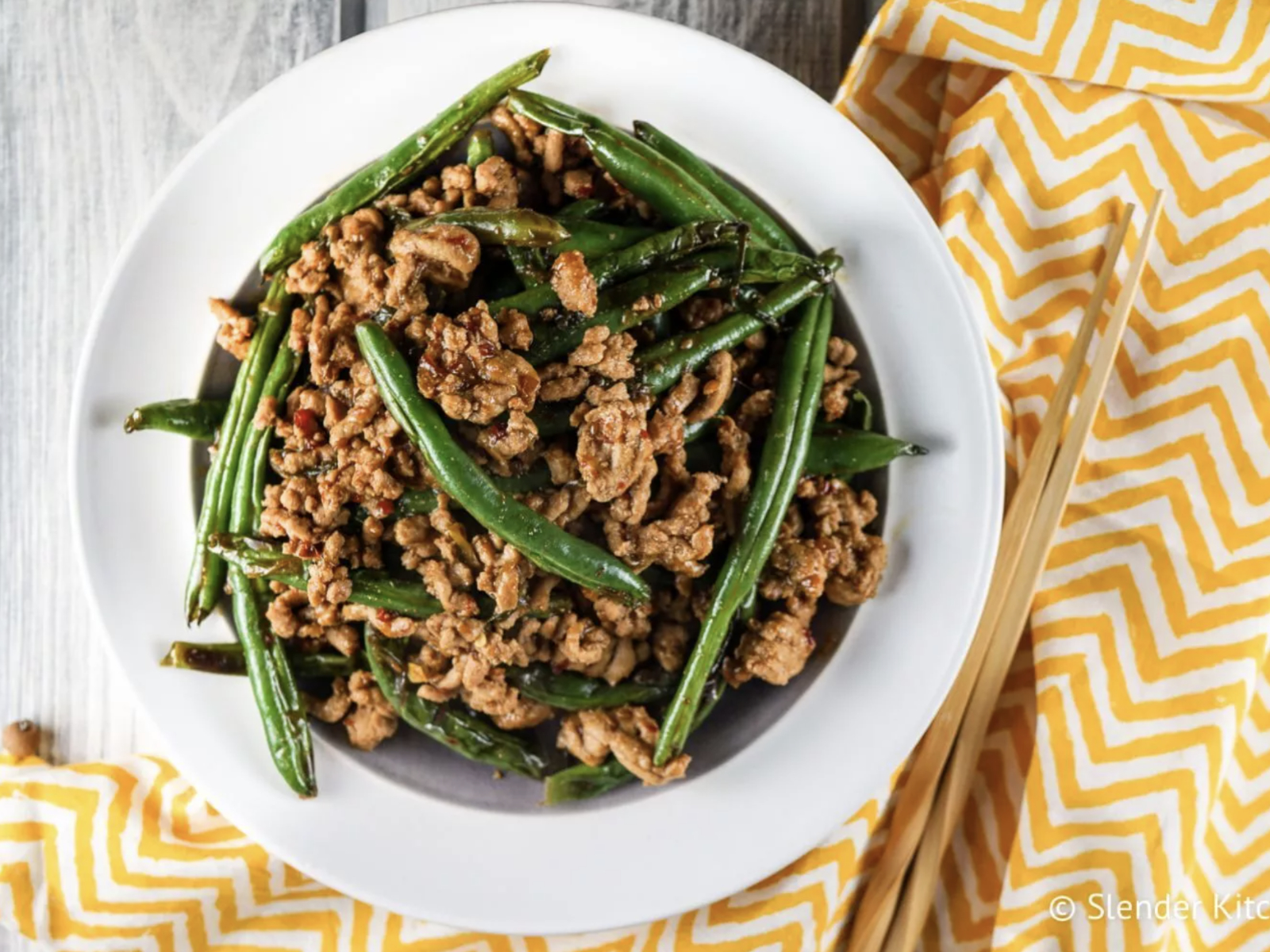 ground turkey with green beans in a bowl