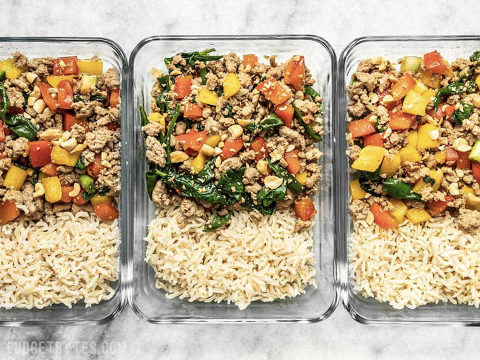 ground turkey stir fry with rice in meal prep containers