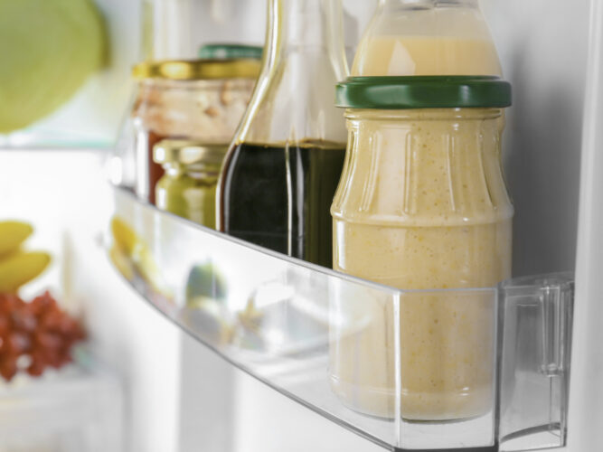 healthy condiments in a fridge