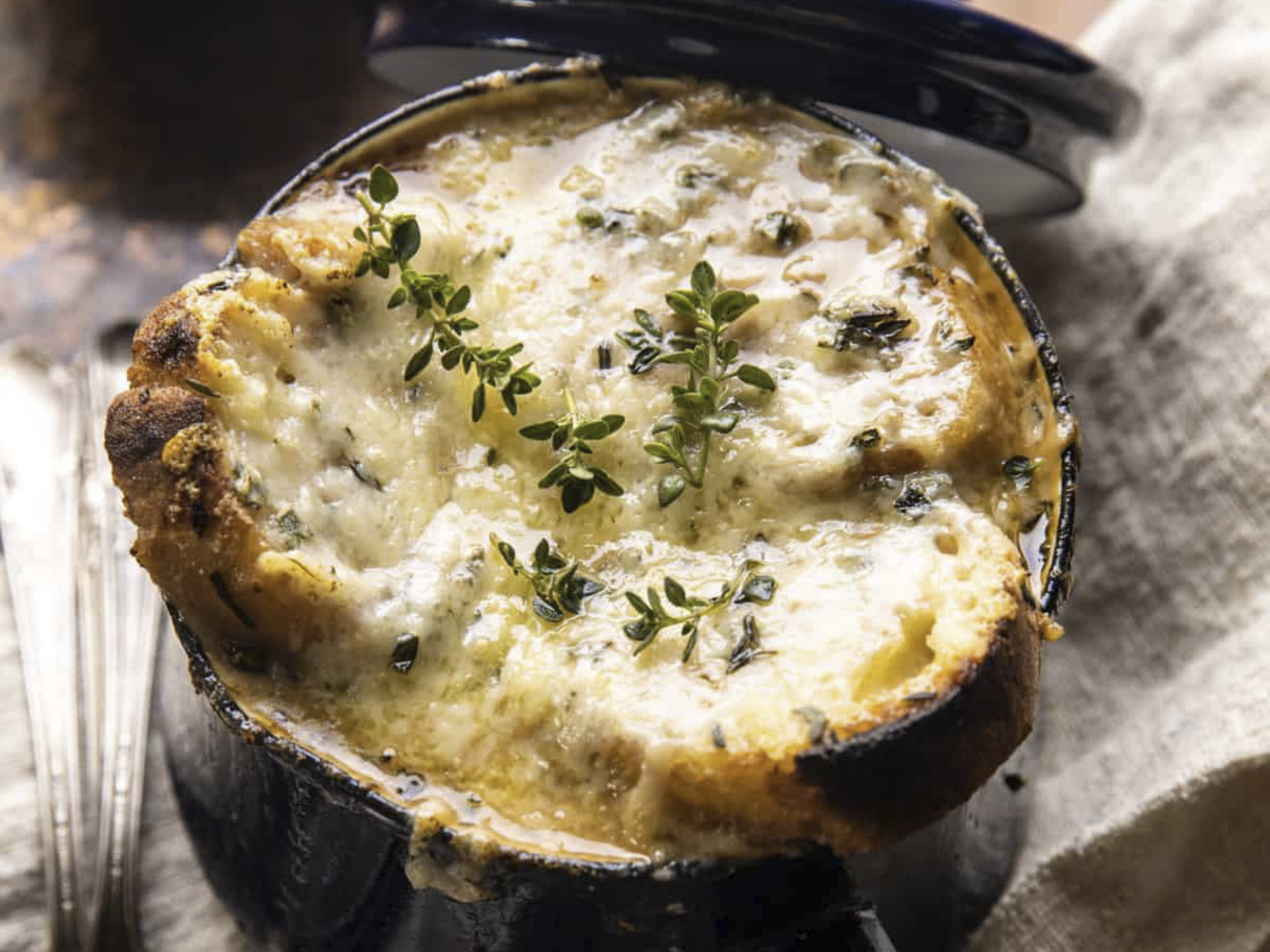 bowl of french onion soup with mushrooms