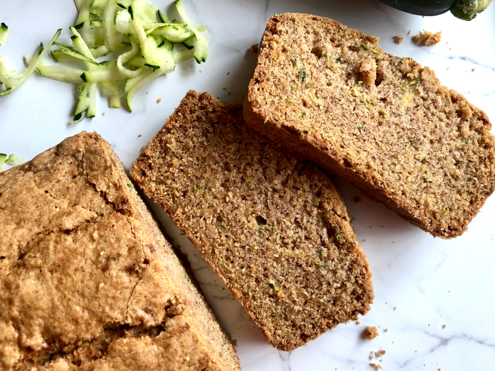 slices of a healthy zucchini bread on a counter