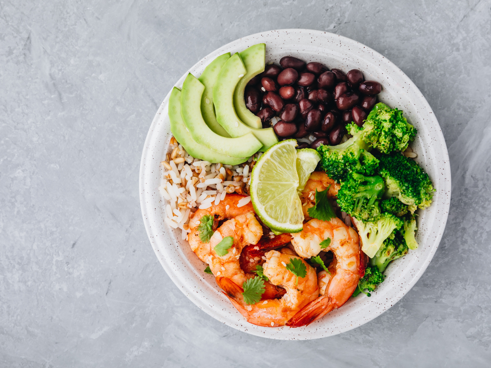 grilled shrimp bowl with broccoli black beans brown rice and avocado