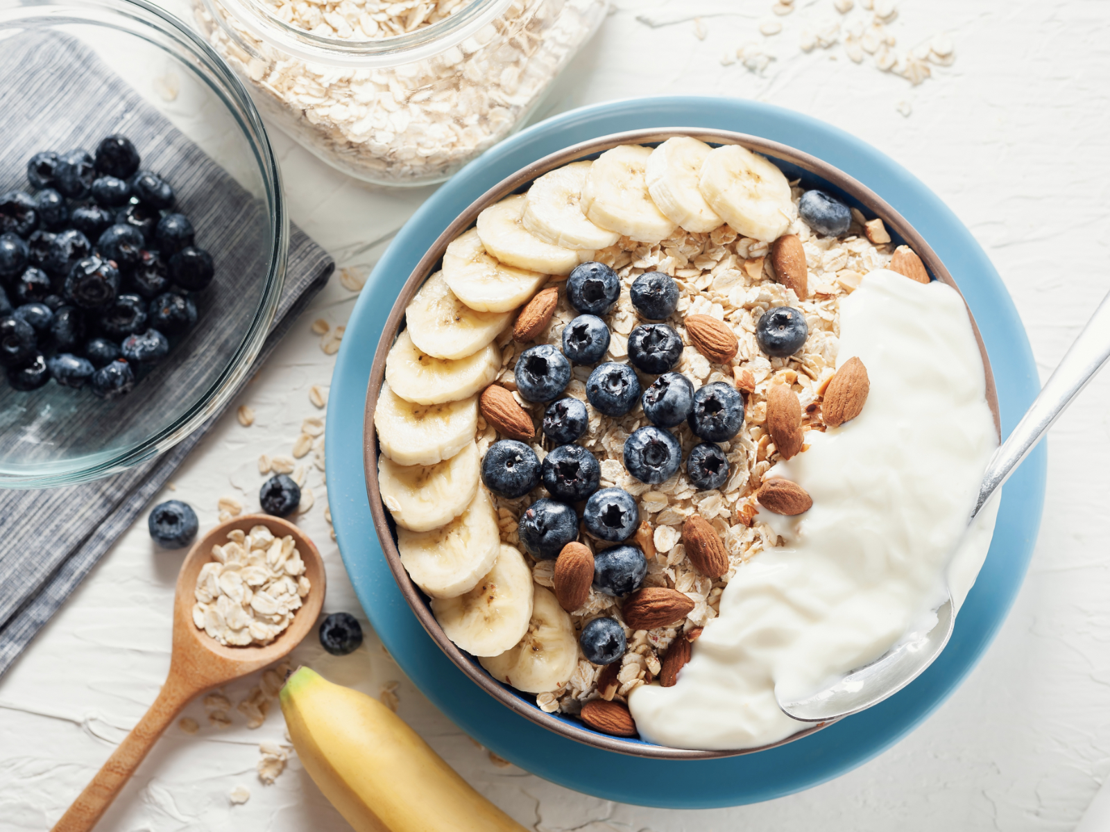 oatmeal bowl with berries nuts and greek yogurt