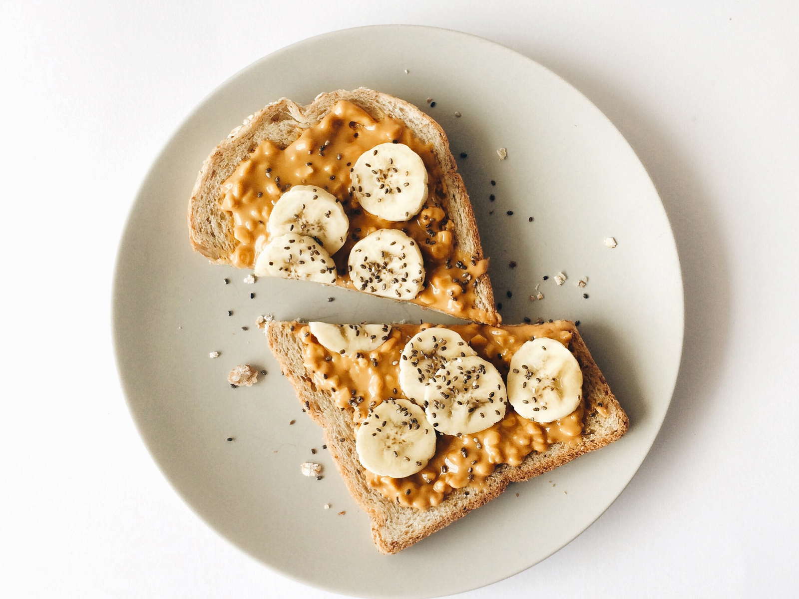 peanut butter on bread with banana and chia seeds