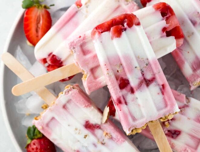 Strawberry yogurt popsicles with granola