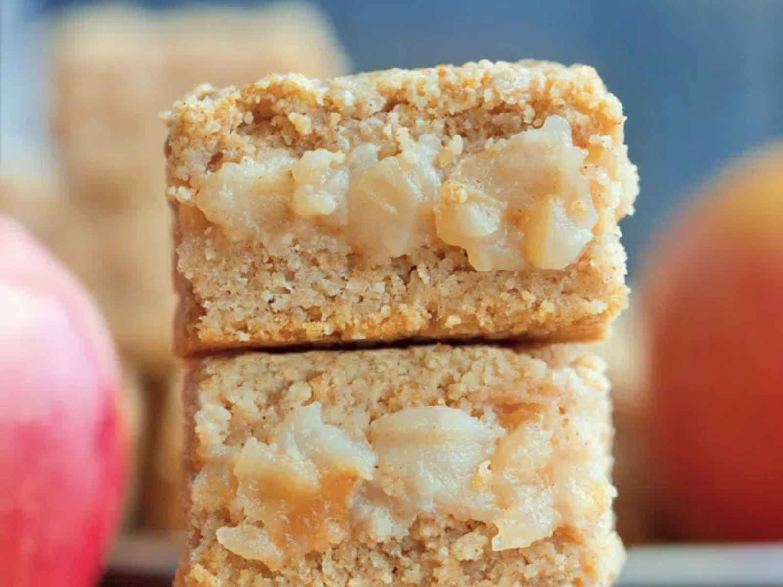 hot apple crumble bars stacked on top of each other
