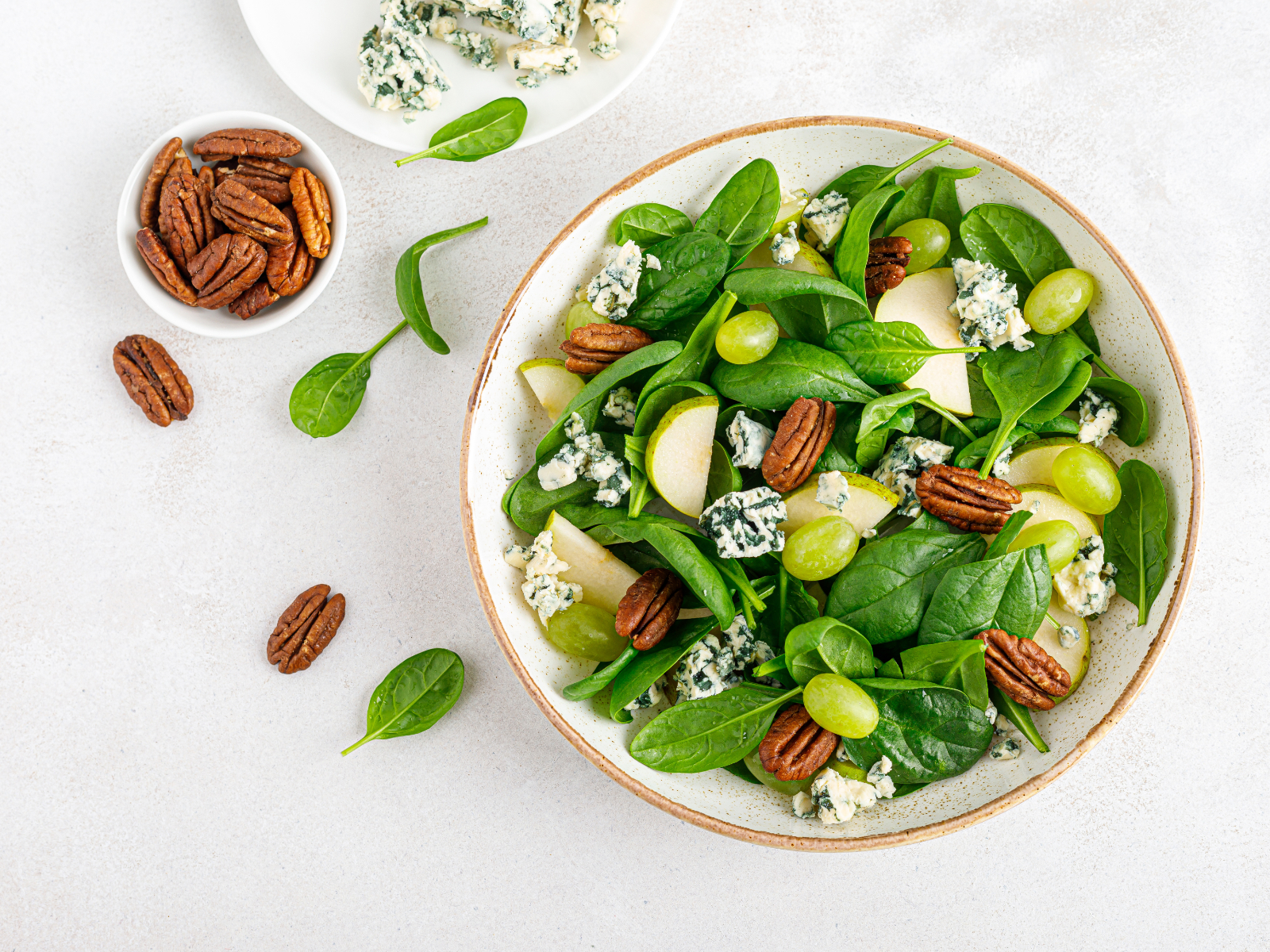 leafy green salad with nuts and fruit