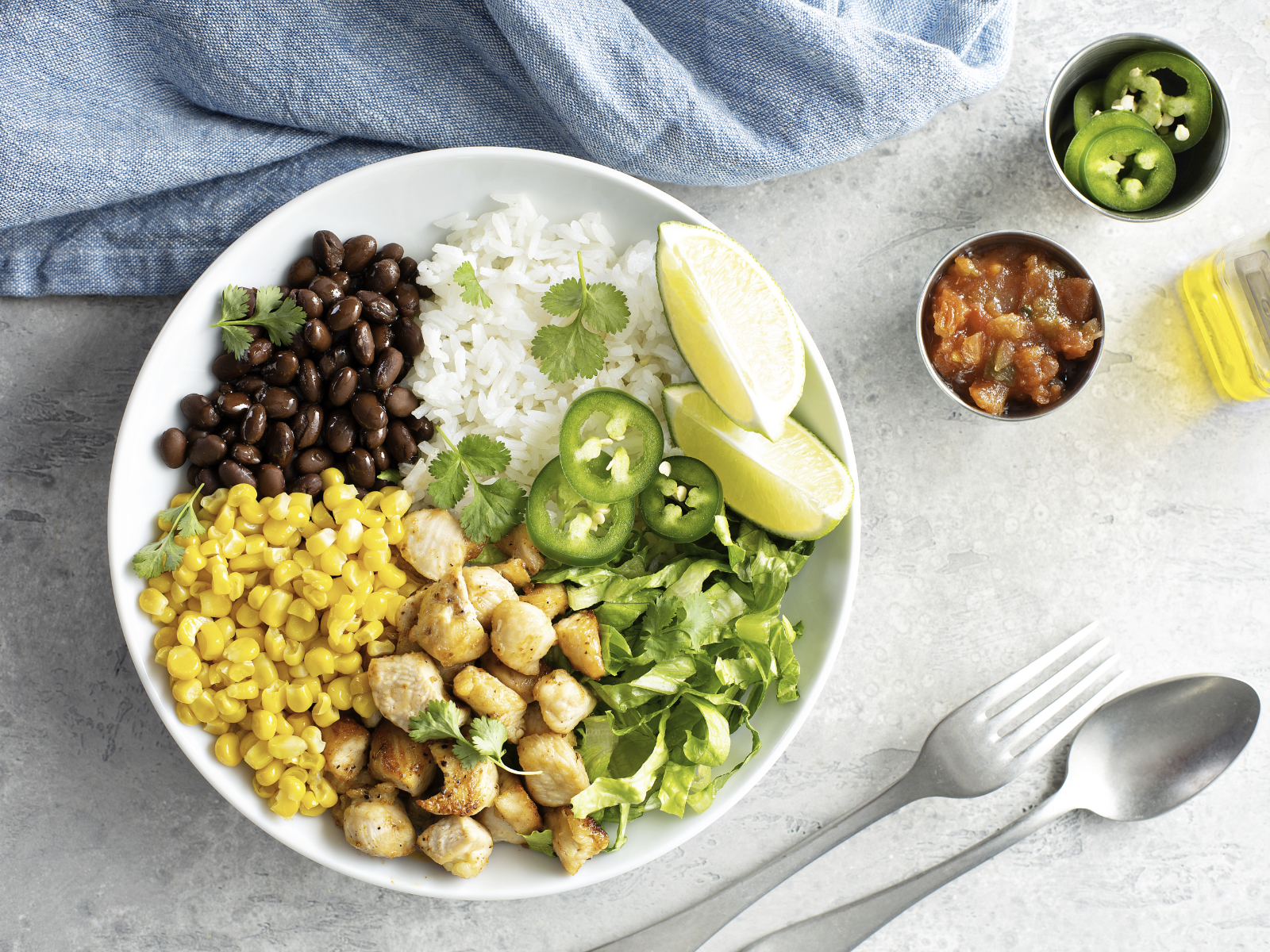 plant based chipotle bowl with beans corn and chickpeas