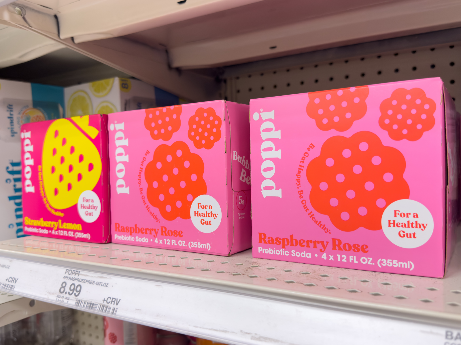 poppi prebiotic sodas in a box on a shelf