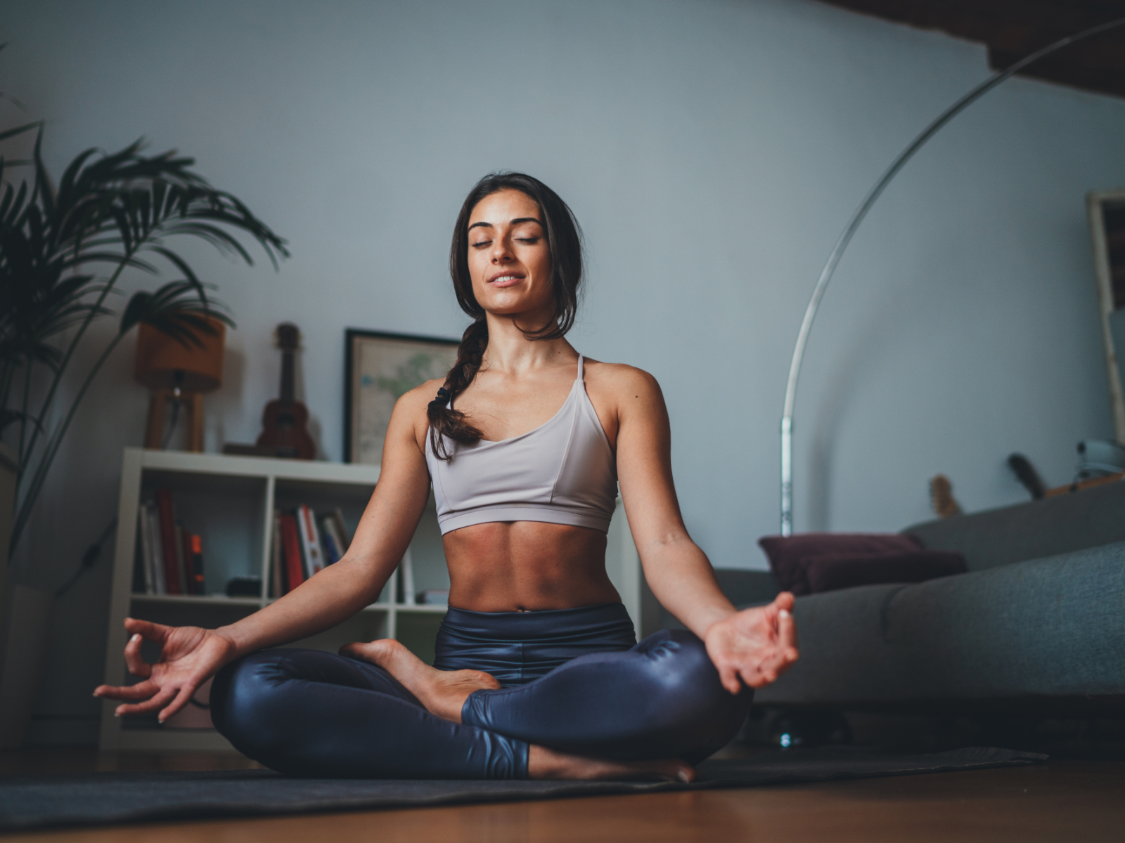 woman meditating to reduce cortisol