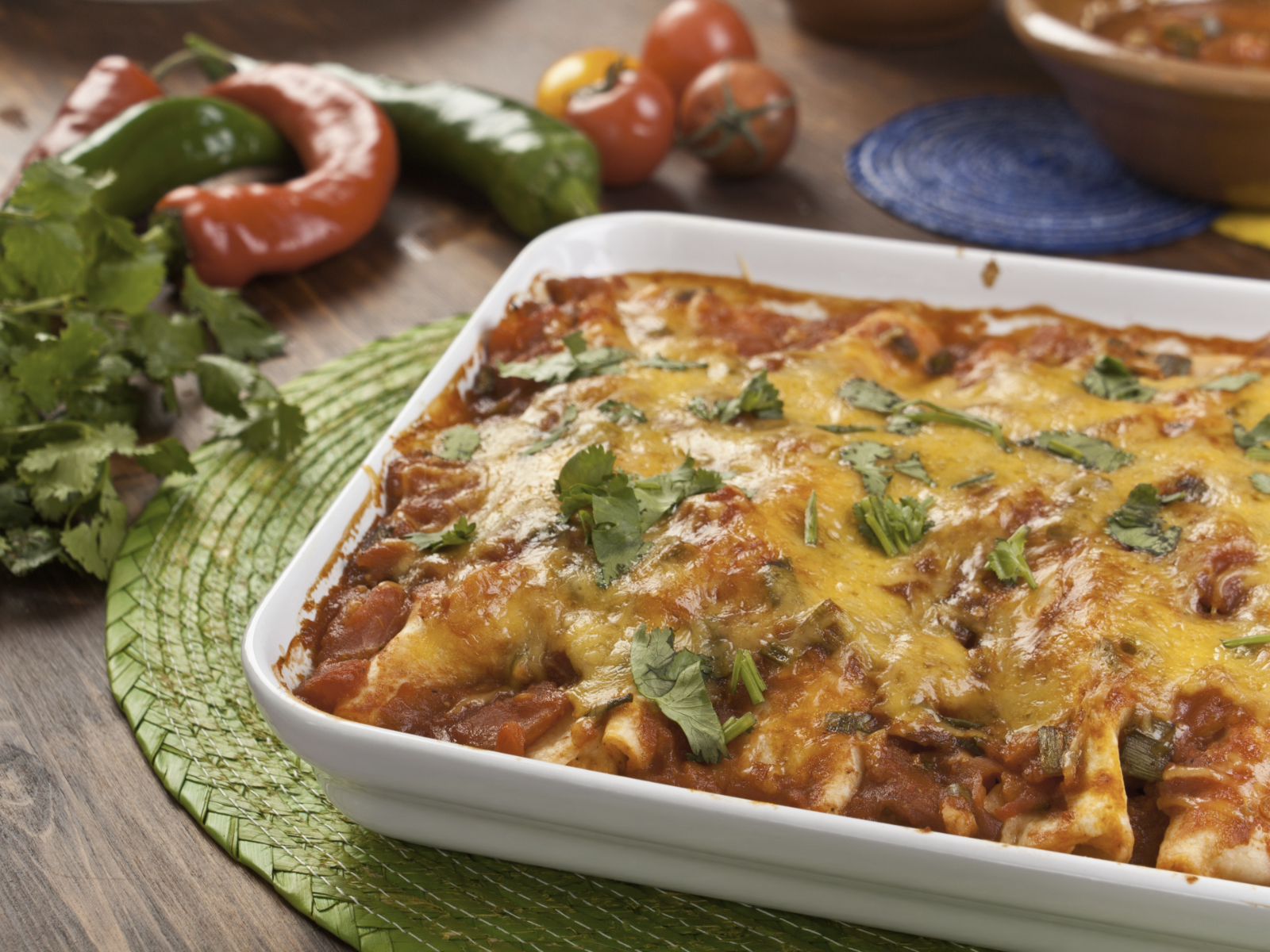 salsa chicken with cheese in a casserole dish