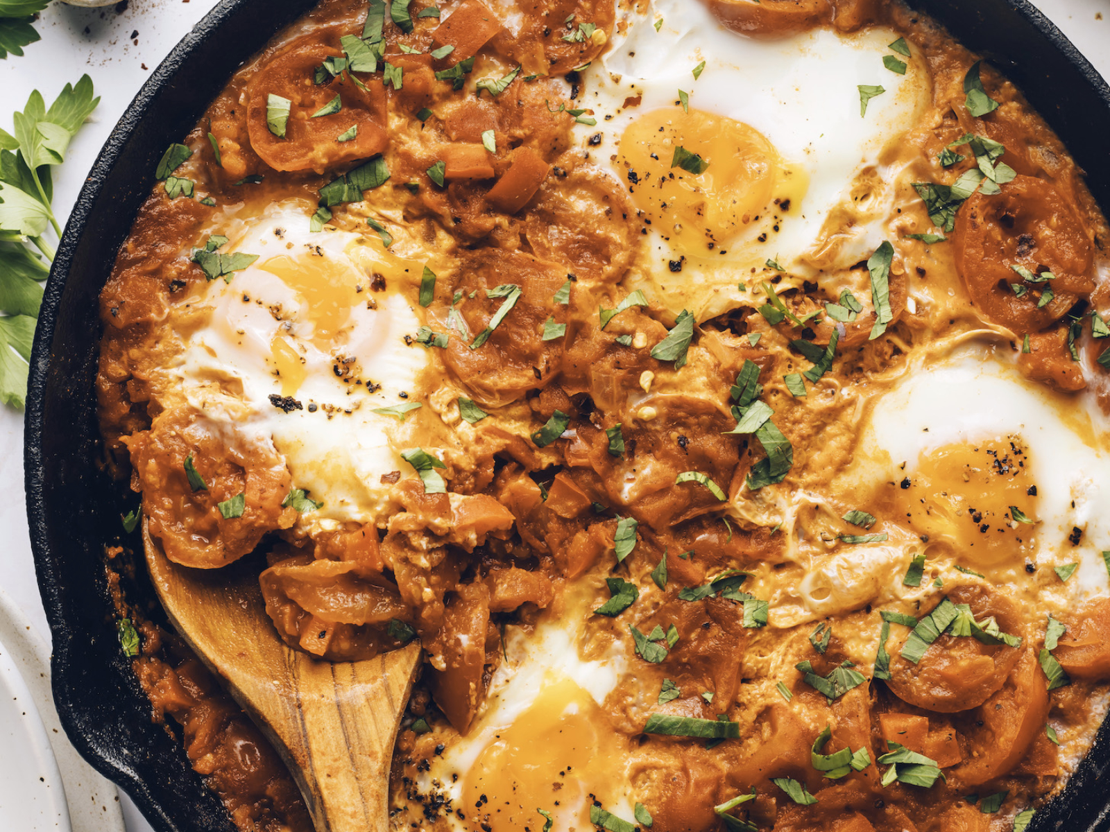 shakshuka with eggs in a skillet