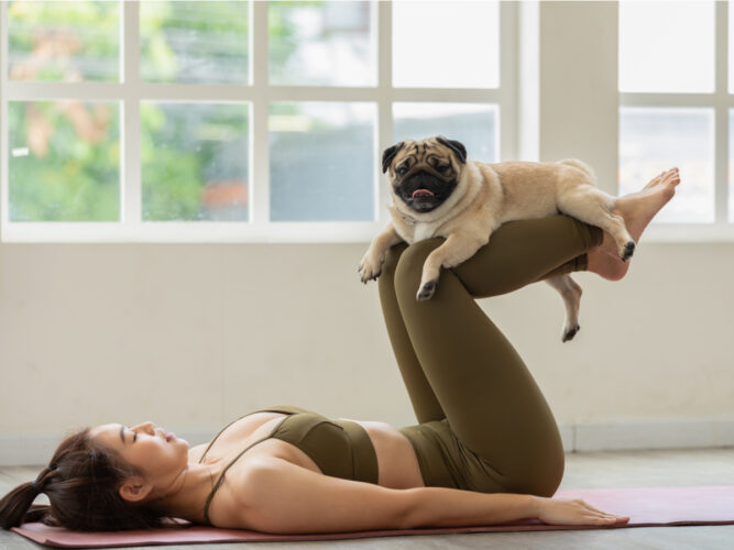 woman working out with her dog