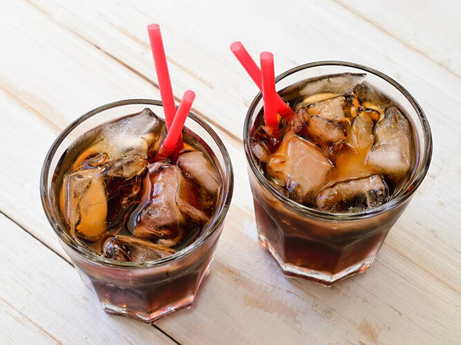 soda in cups with straws