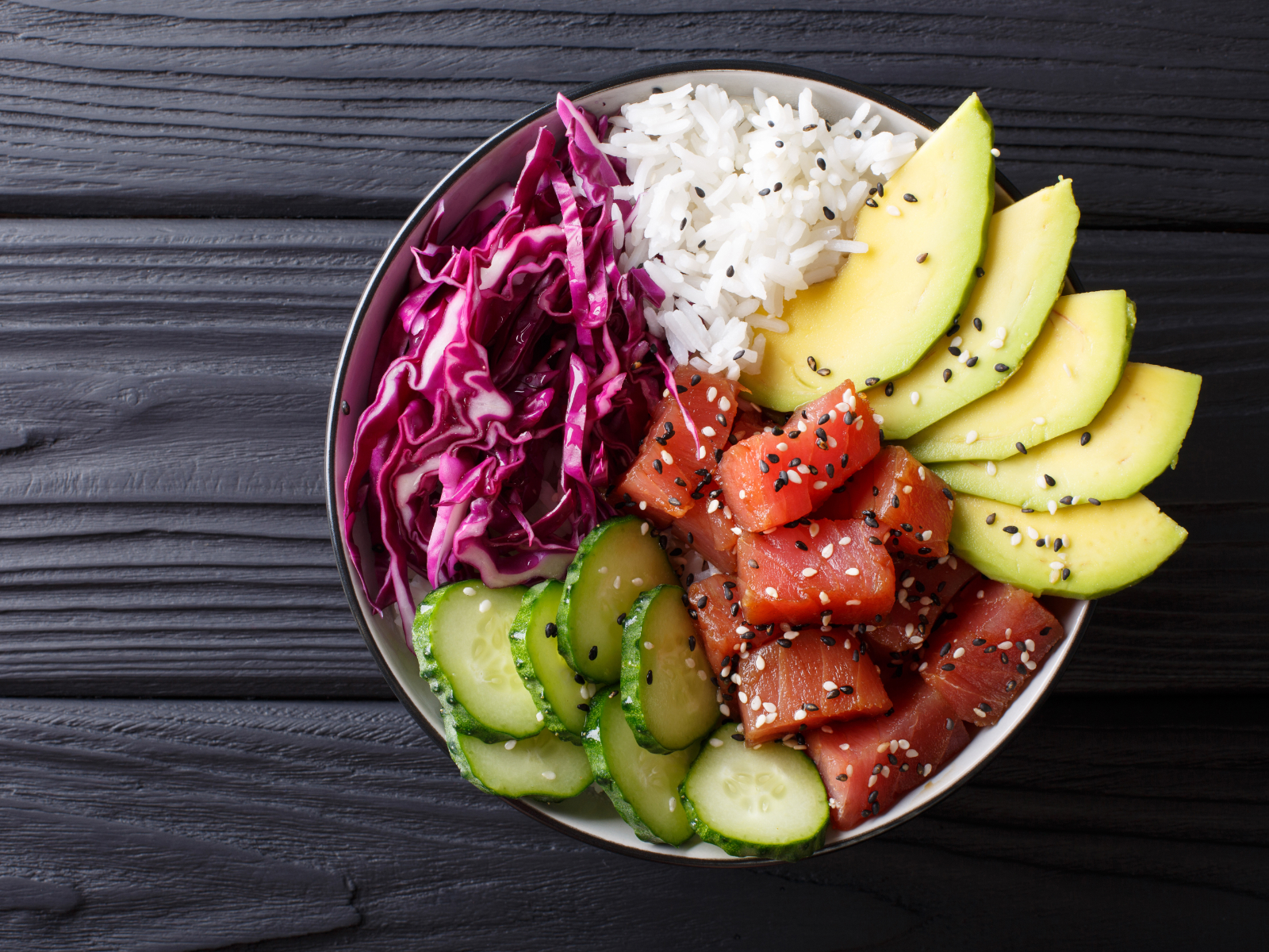 tuna poke bowl with veggies and rice
