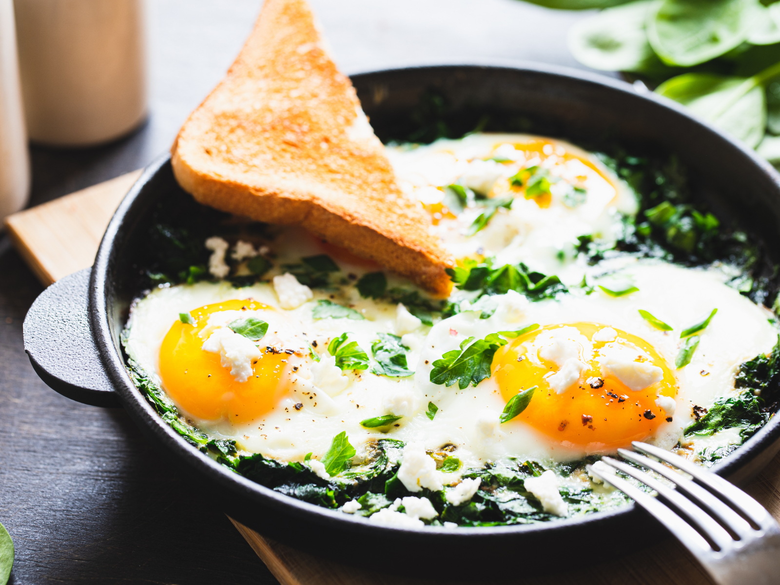 feta eggs in a skillet with toast